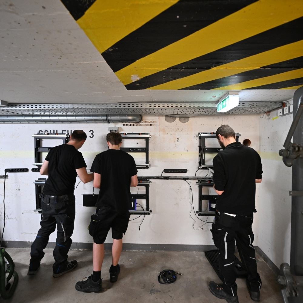 Techniker/innen bei der Arbeit